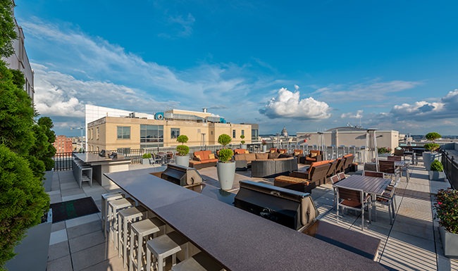 rooftop patio with view of city rooftop patio with view of city