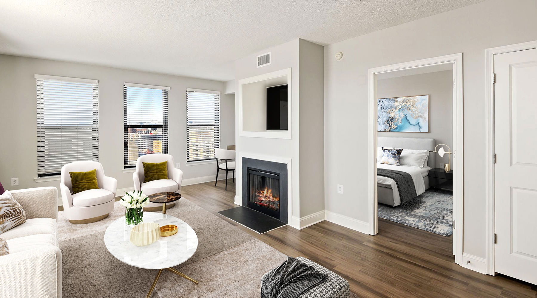 v living room with fireplace and white furniture